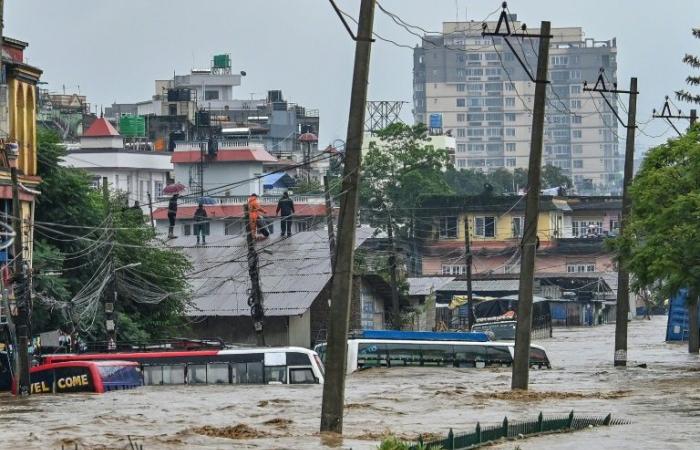 At least 101 dead, 64 missing in Nepal floods