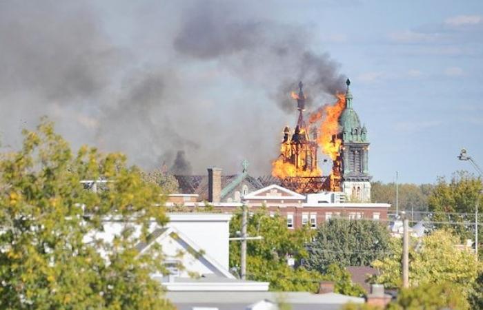 The Notre-Dame-des-Sept-Allégresses church is engulfed in flames