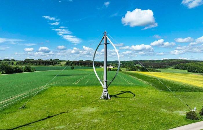 The first ovoid wind turbine commissioned in Normandy disrupts the surrounding solar panels