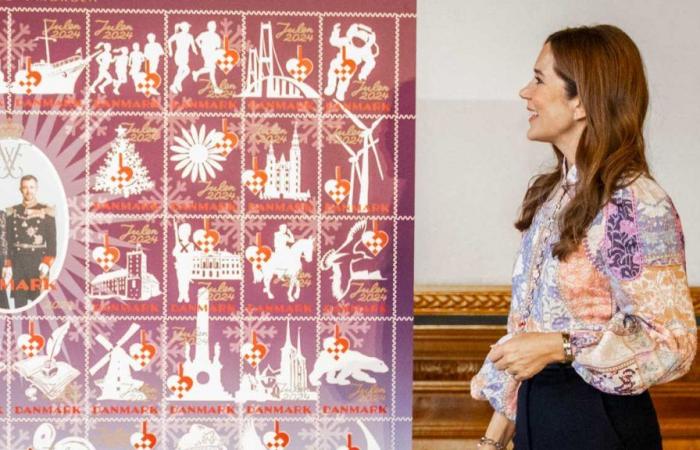 Queen Mary unveils Christmas stamps honoring new royal couple