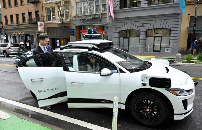 Tesla shows robotaxi and self-driving bus