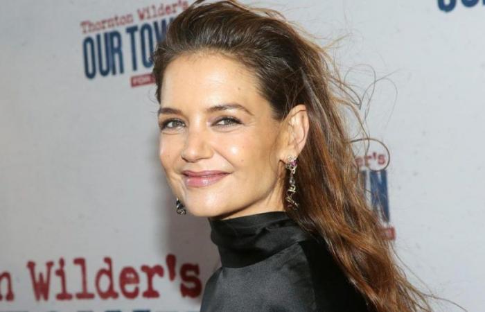 The splendid appearance of Katie Holmes in a black satin dress on Broadway