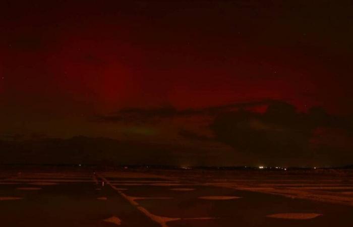 An aurora borealis visible this night above the salt marshes in Batz-sur-Mer