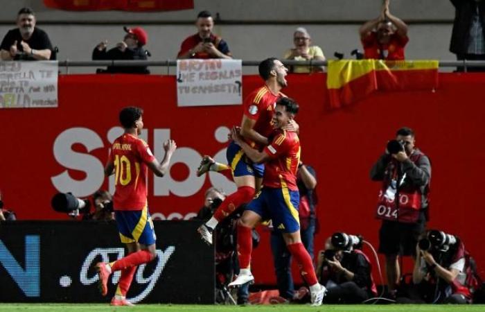 Spain beat Denmark to top their Nations League group