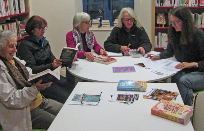 Librarians are working on the Winter Book Fair