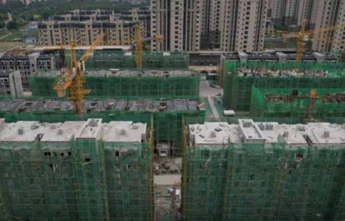 China to almost double its aid to unfinished real estate projects: News