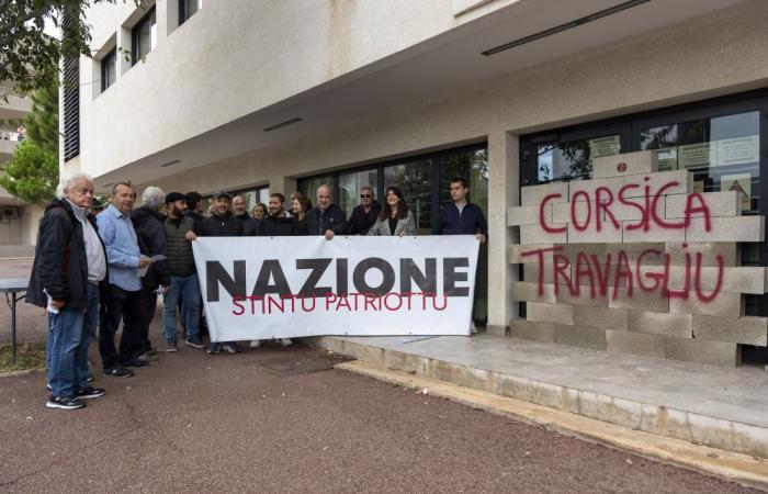 Nazione independence activists wall off the entrance to France Travail in Bastia