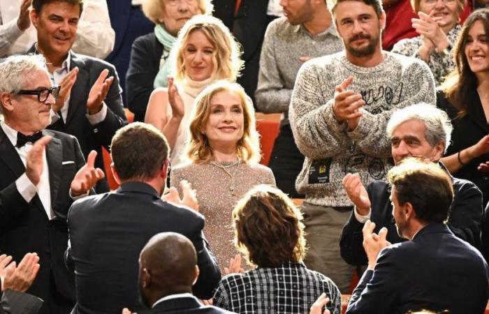 Isabelle Huppert supported by her husband Ronald and her sons, Lorenzo and Angelo, at the Lumière Festival