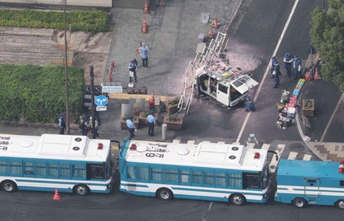 Man arrested after firebombs thrown at Japan’s ruling party HQ and car driven into security fence around PM’s office | World News