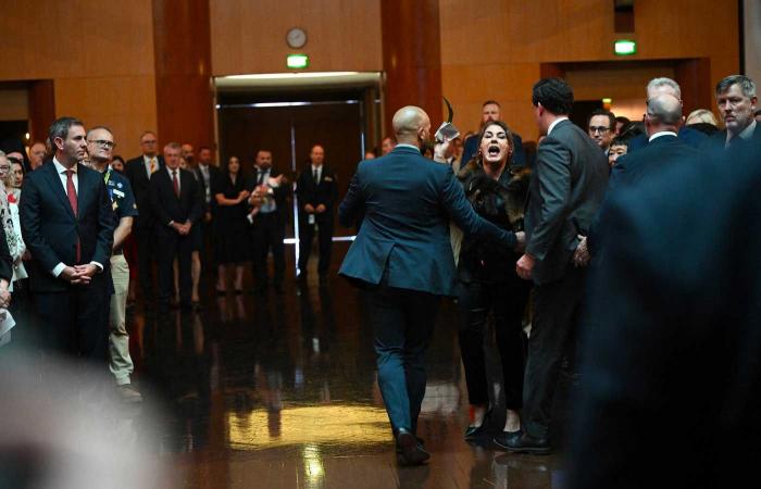 King Charles III threatened and insulted by Australian senator forcibly evacuated from parliament in Canberra