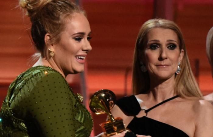 Adele interrupts her concert and bursts into tears to hug Celine Dion, present in the audience