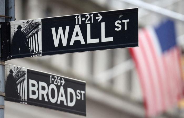 Wall Street ends up and ignores a bad employment figure