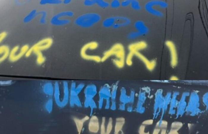 mysterious pro-Ukrainian tags painted on 45 parked vehicles