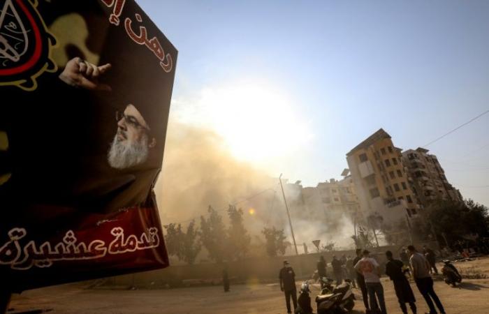 In the southern suburbs of Beirut, portraits of “martyrs” float on the ruins