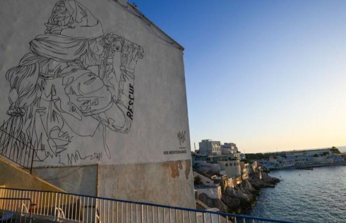 A giant fresco by Mahn Kloix pays tribute to the SOS Méditerranée ambulance ship on the “Zidane wall” in Marseille