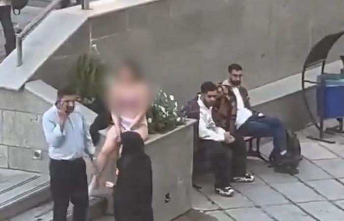 Student arrested in Iran after undressing in public in protest