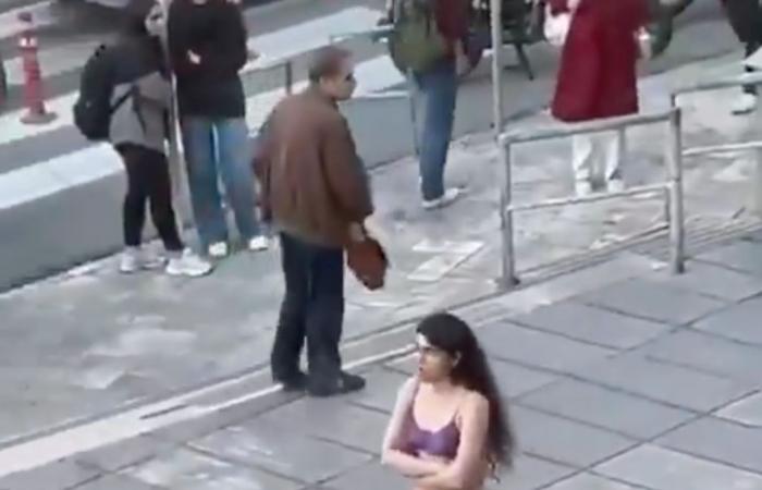 a student undresses in front of her university to protest against the moral police, before being arrested