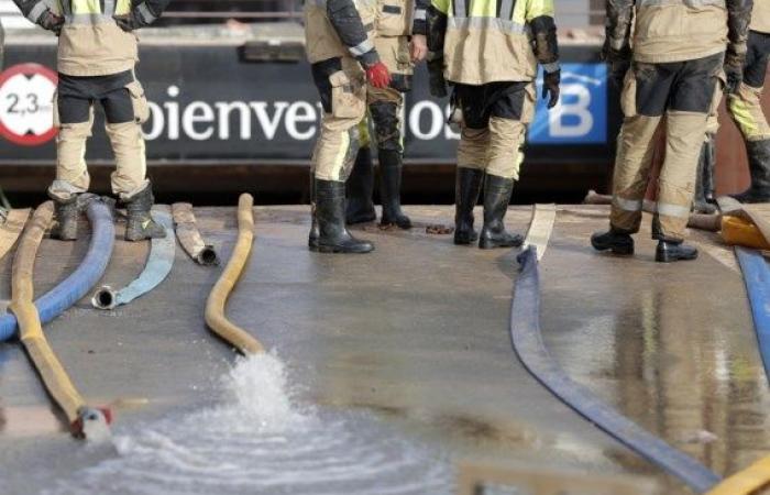 Spanish emergency services looking for missing people in flooded parking garages