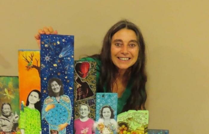 She paints inhabitants of Querrien on pallet boards