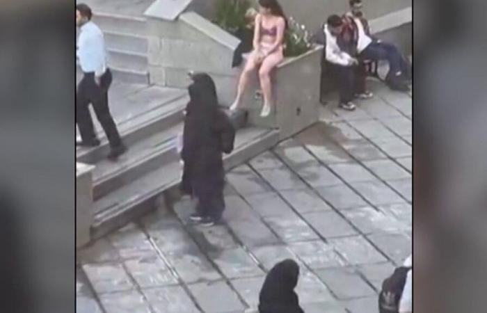 an undressed student at a university in Tehran