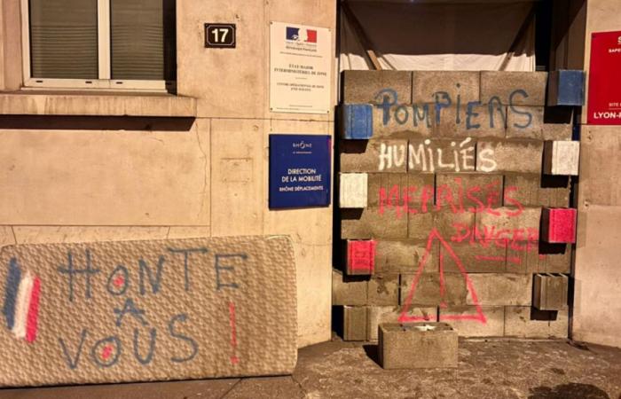 Rhône firefighters wall up the entrance to the SDMIS headquarters