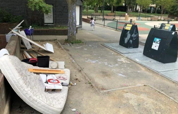 A resident places his garbage in front of the prohibition sign provided for this purpose