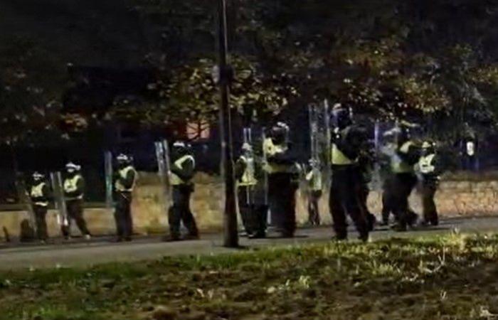 Riot cops clash with firework yobs and police chopper called in as gangs torch bins & launch bottles