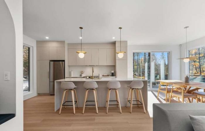 A modern and bright chalet built in 2024 for sale for $699,900 in Saint-Côme