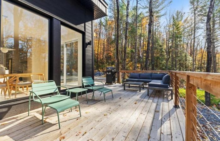 A modern and bright chalet built in 2024 for sale for $699,900 in Saint-Côme