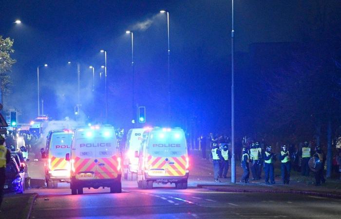 Riot cops clash with firework yobs and police chopper called in as gangs torch bins & launch bottles