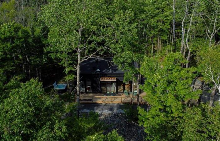 A modern and bright chalet built in 2024 for sale for $699,900 in Saint-Côme