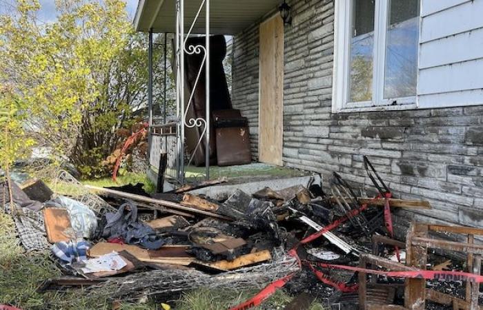 A three-unit building damaged by fire in Alma