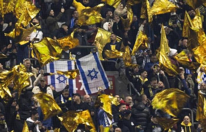 Maccabi Tel Aviv fans attacked during violent clashes on the sidelines of the match against Ajax Amsterdam