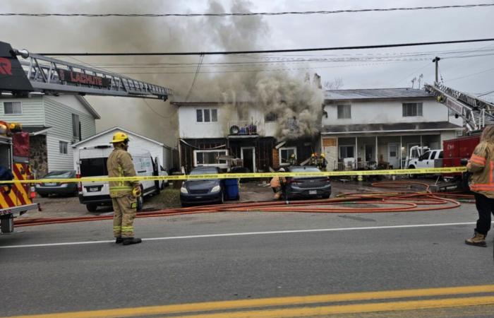 Fourteen people on the streets after a fire in Brownsburg-Chatham