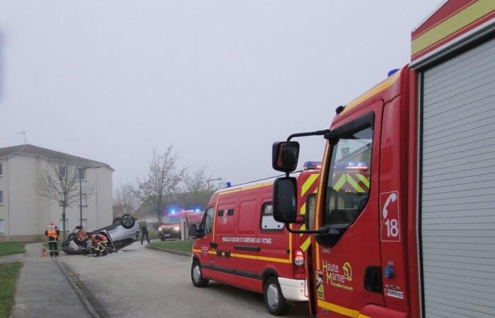 in the middle of a housing estate, the vehicle ends up on the roof