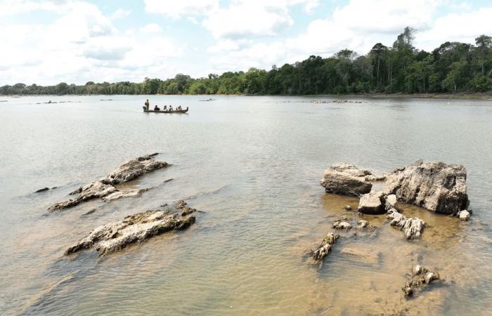 the Maroni at its lowest, the canoes and the goods paralyzed