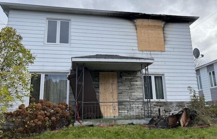 A three-unit building damaged by fire in Alma