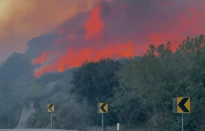 the state of California still in the grip of flames