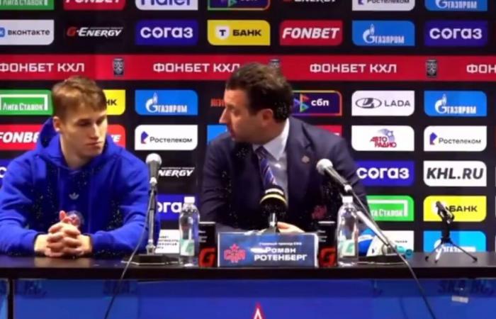 Demidov looks fearful in front of his coach at press conference