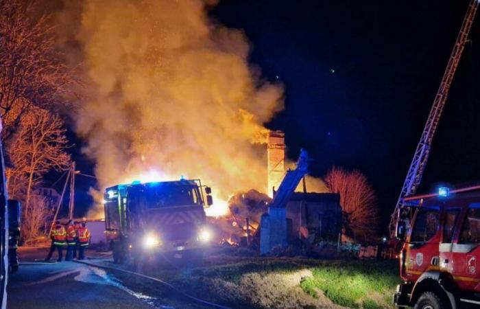 a completely engulfed agricultural building