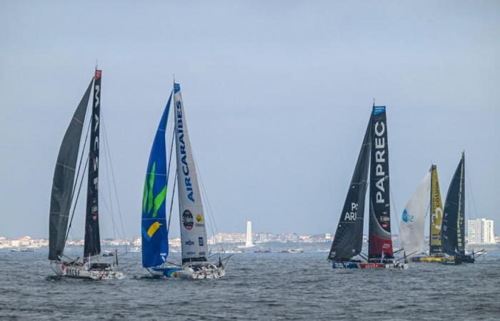 Skipper Sébastien Simon on Groupe Dubreuil at the start in the bay