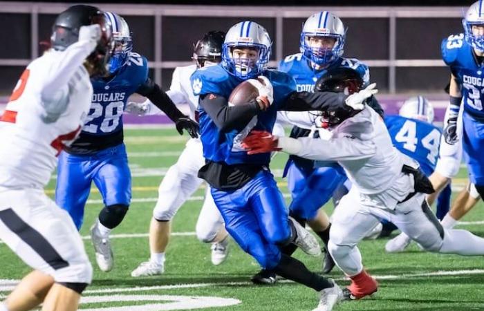 A Cougars player tackles his teammate… for the victory