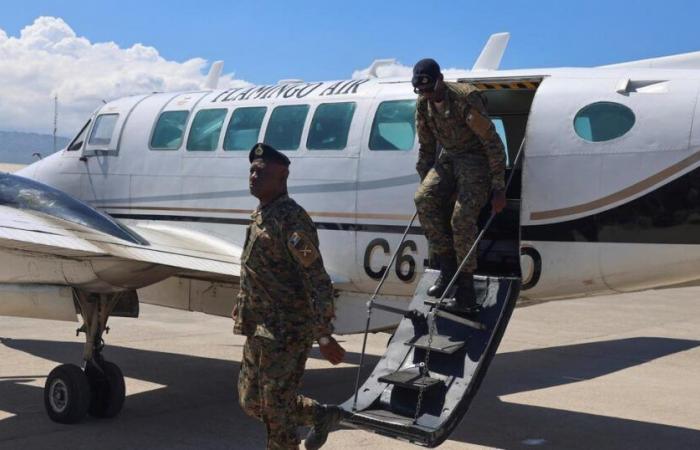 an airliner bound for Port-au-Prince hit by gunfire