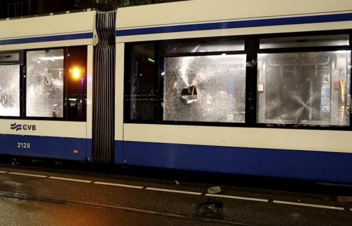 tram fire and anti-Semitic slogans during riots in Amsterdam, several arrests