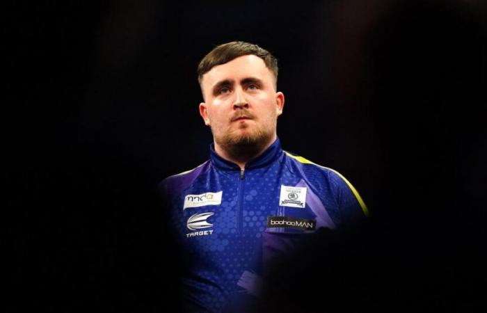 Luke Littler misses double for nine-dart finish but claims Grand Slam victory