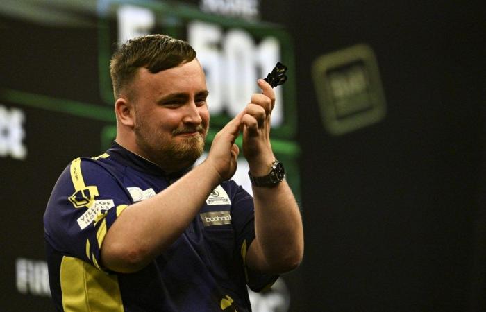 Luke Littler plays the showman at the Grand Slam of Darts as he misses out on record-breaking 9-darter by millimetres