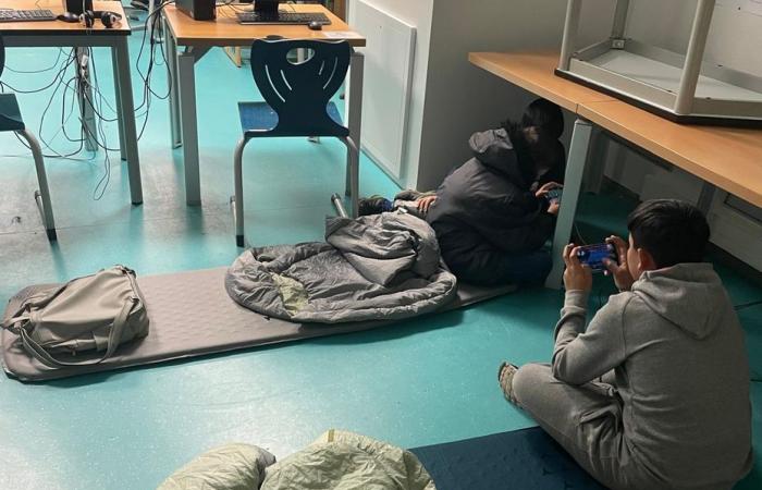 Teachers bring migrant students into school for the night without permission