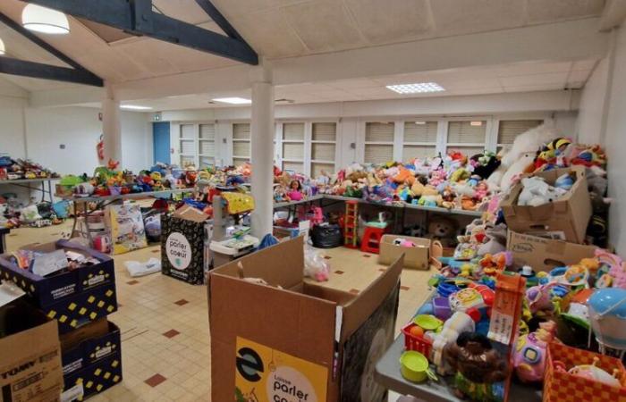 a large solidarity collection of unused toys organized to give them a second life