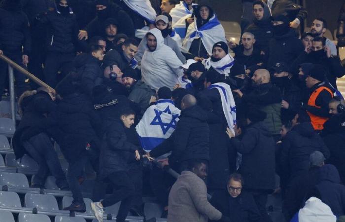 scuffles between supporters in the stands of the Stade de France