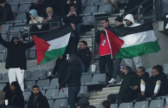 despite the ban, Palestinian flags were waved at the Stade de France